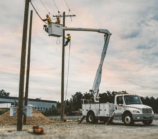 Lineman working from a bucket truck