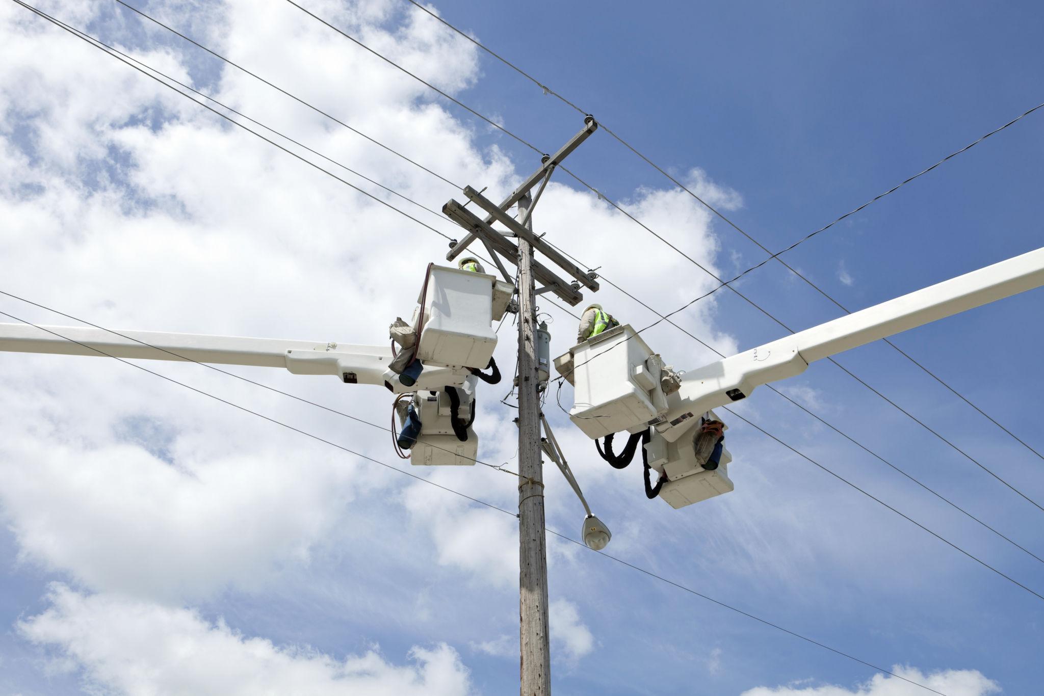 Lineman working high above the ground
