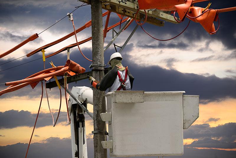 Lineman working during storm conditions